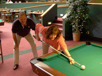 Jerry Briesath Teaching Pool Lesson to a student